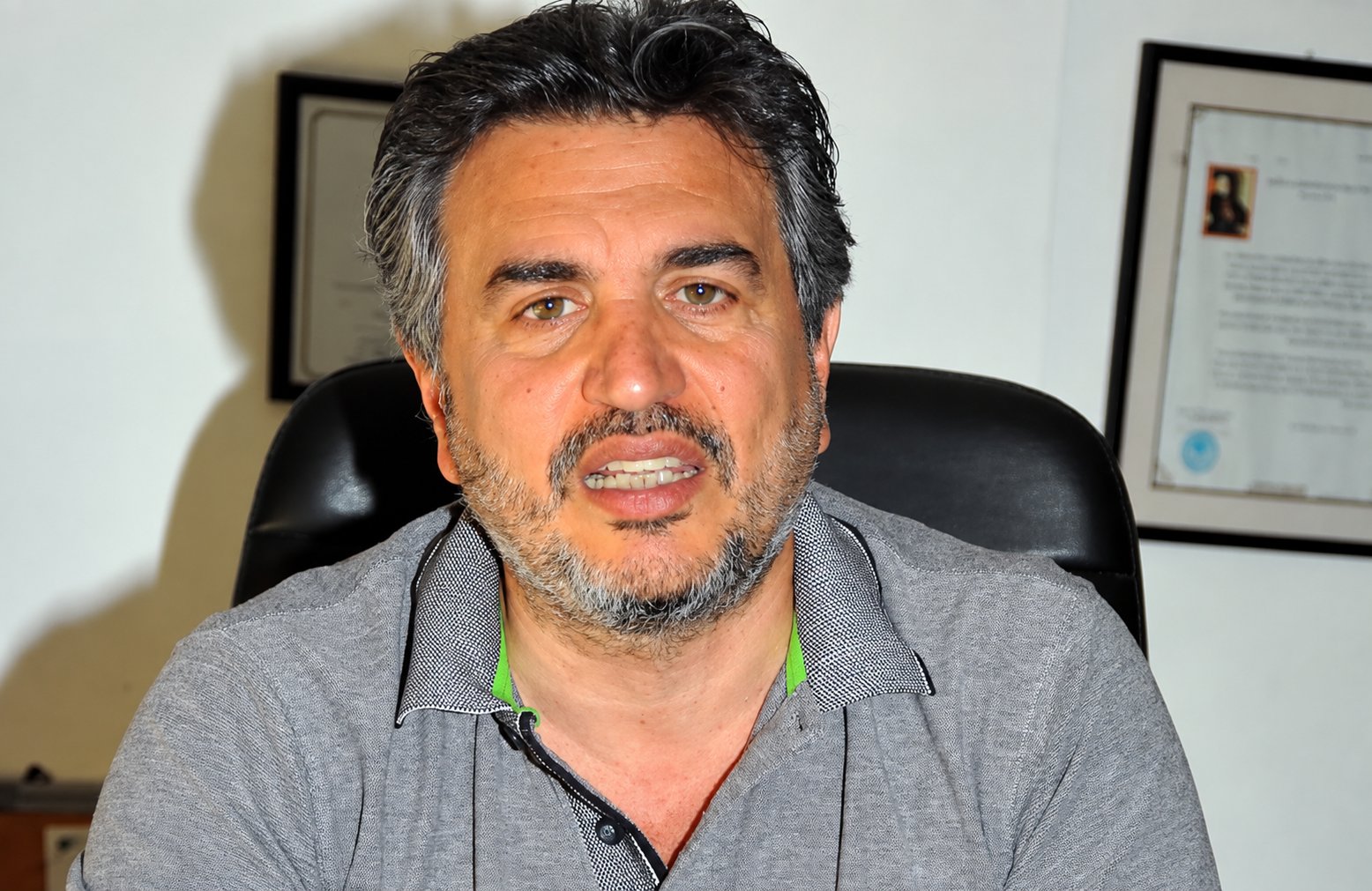 Clear solo office portrait of Maroun El Khaouli